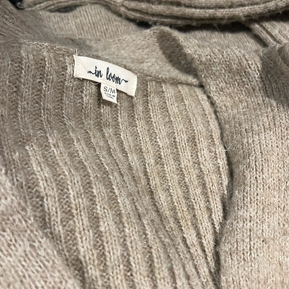 Oversized cardigan sweater in oatmeal.